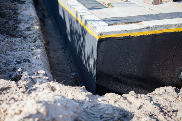 Professional Waterproofing technician working in Lawrenceville, GA